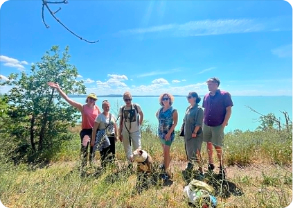 Hiking with friends above the lake