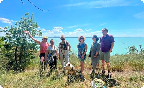 Hiking with friends above the lake