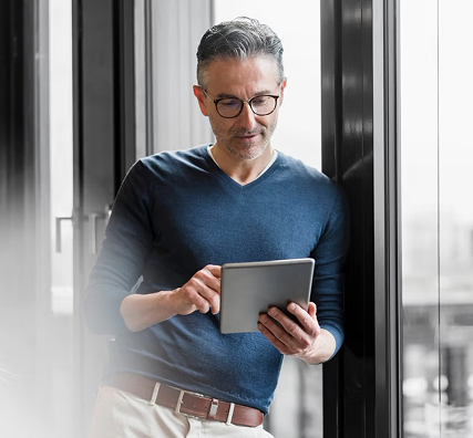 Board director reading on a tablet